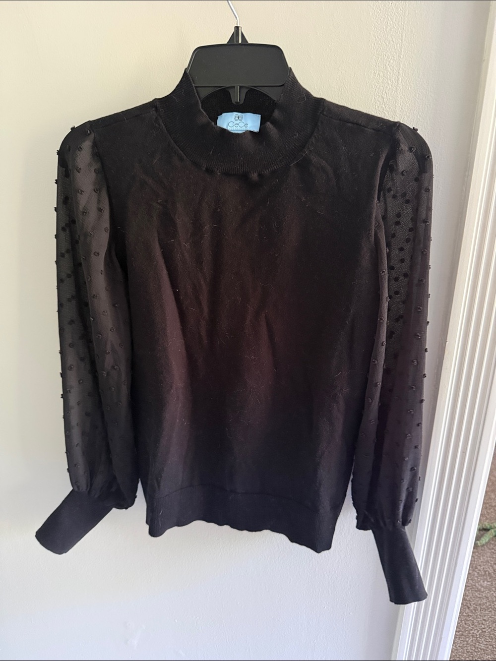 CeCe Black Mock Neck Top with Sheer Dot Sleeves